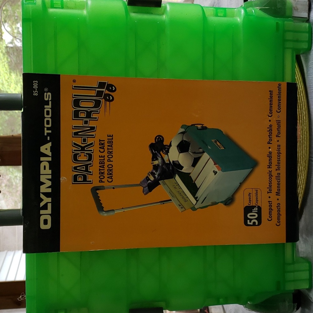 Olympia took Pack N Roll, NIB